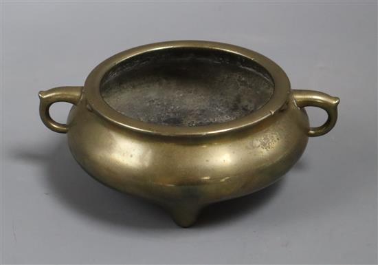 A Chinese bronze tripod censer, 19th century diameter 12cm